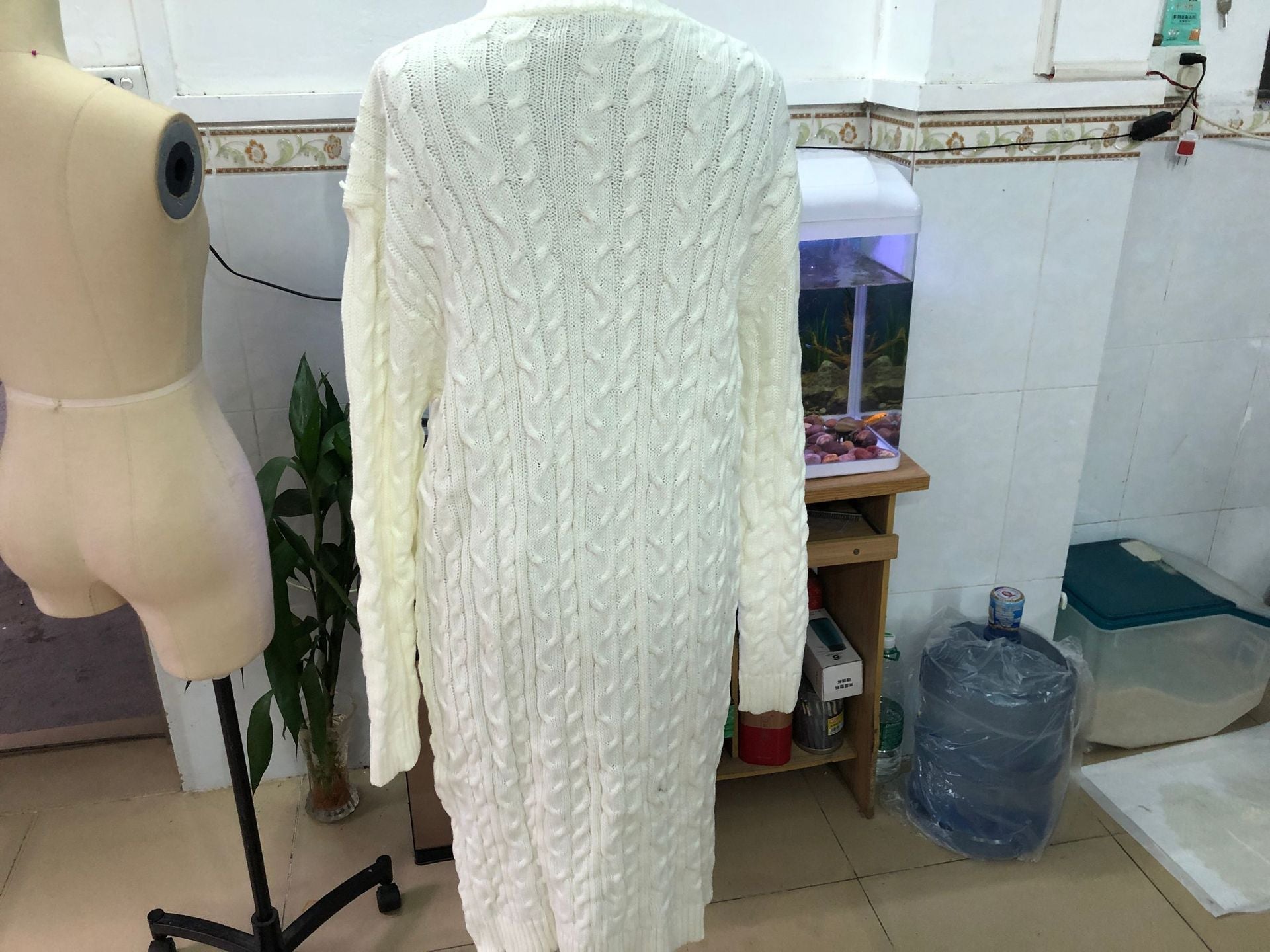 Double pocket full body twist sweater - Amara Luxe Fine Boutique